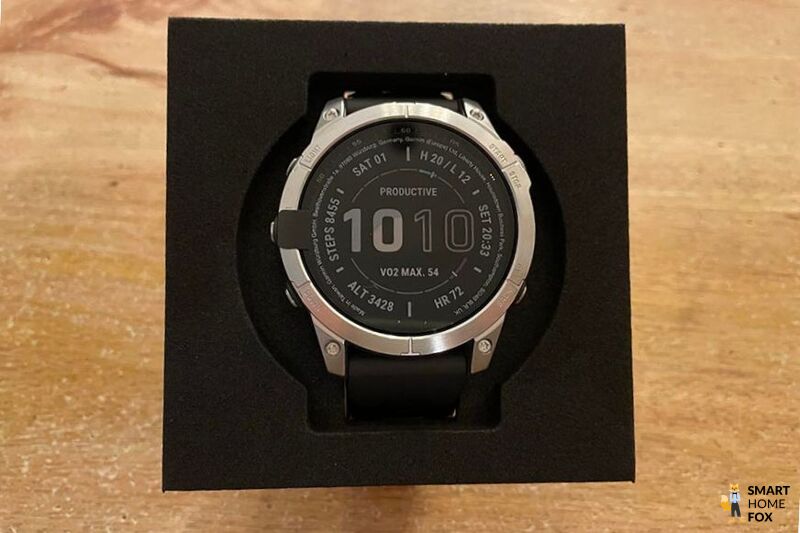 The Garmin Fenix 7 is seen in its packaging.